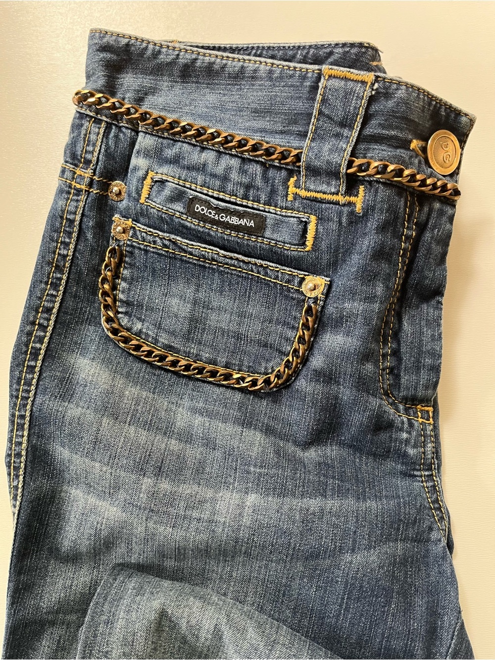 Rare Dolce Gabbana soft denim jeans trimmed with heavy bronze chain. Sz 40